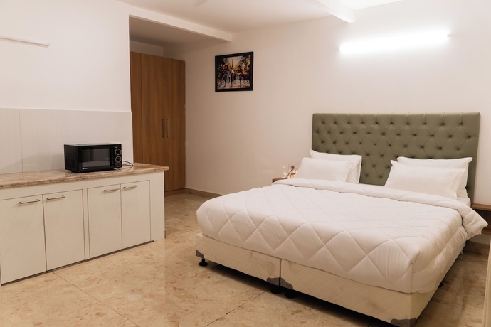 Imagen de la habitación del Hotel Sandane Homes India Expo Centre and Mart. Foto 4