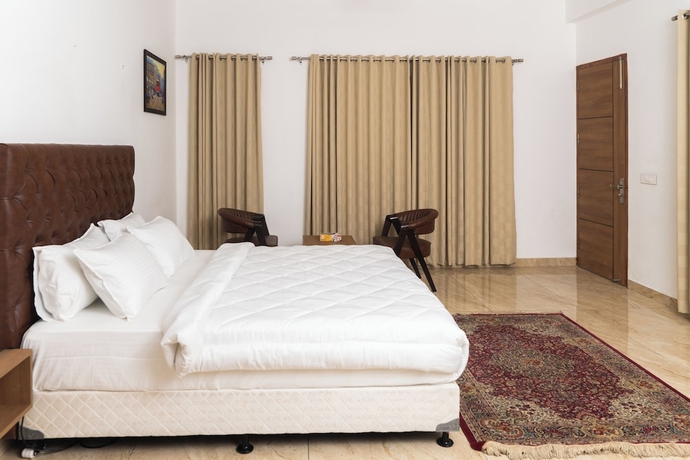 Imagen de la habitación del Hotel Sandane Homes India Expo Centre and Mart. Foto 5