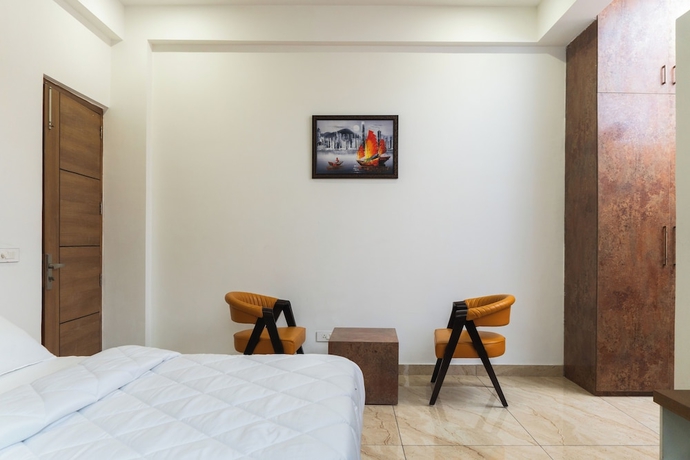 Imagen de la habitación del Hotel Sandane Homes India Expo Centre and Mart. Foto 7