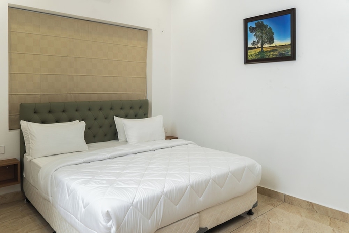 Imagen de la habitación del Hotel Sandane Homes India Expo Centre and Mart. Foto 8