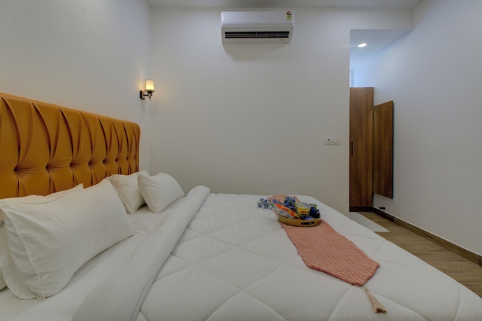 Imagen de la habitación del Hotel Sandane Homes India Expo Centre and Mart. Foto 11