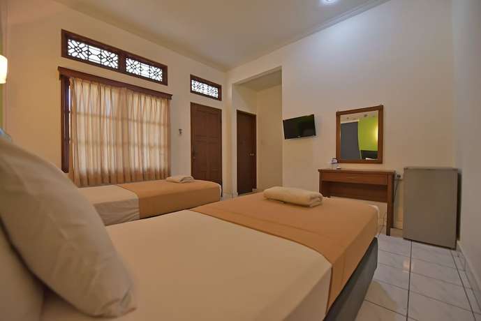 Imagen de la habitación del Hotel Sandat Kuta. Foto 2