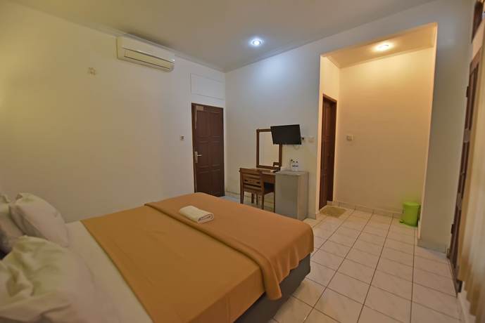 Imagen de la habitación del Hotel Sandat Kuta. Foto 4