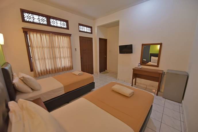 Imagen de la habitación del Hotel Sandat Kuta. Foto 5