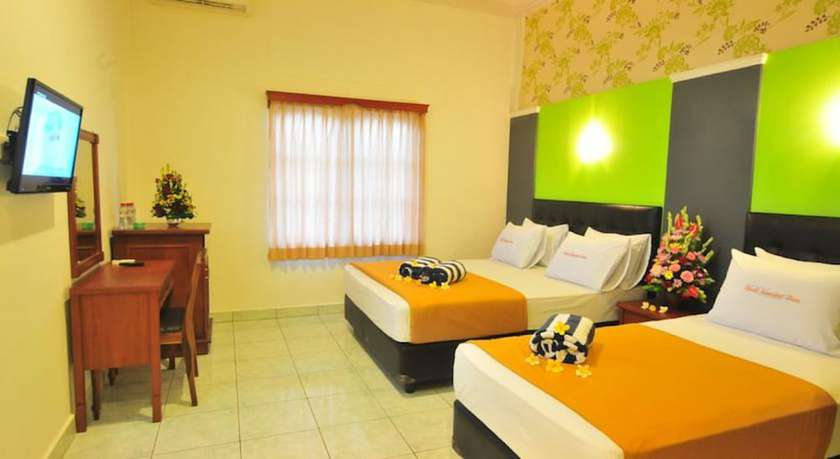 Imagen de la habitación del Hotel Sandat Kuta. Foto 6