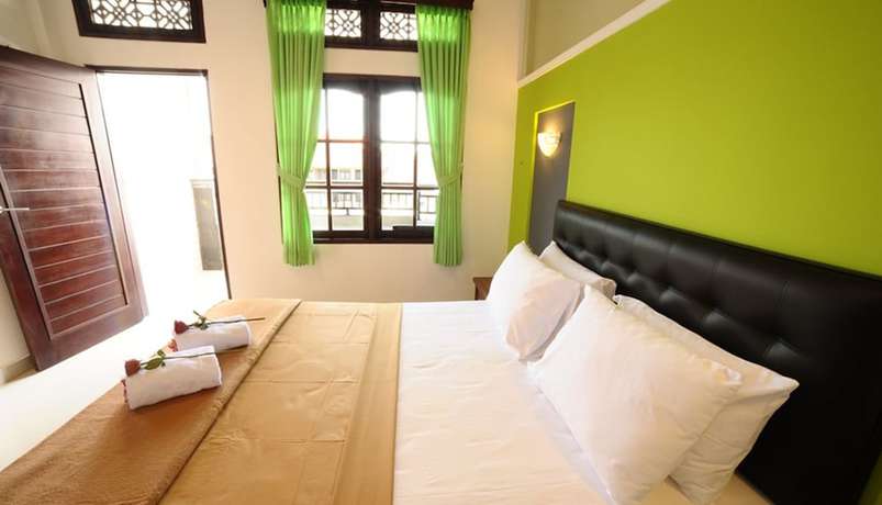 Imagen de la habitación del Hotel Sandat Kuta. Foto 7