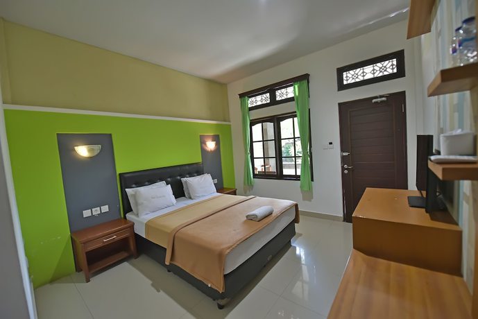 Imagen de la habitación del Hotel Sandat Kuta. Foto 8