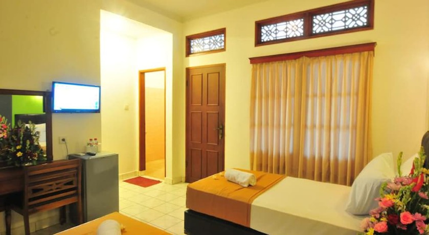 Imagen de la habitación del Hotel Sandat Kuta. Foto 12