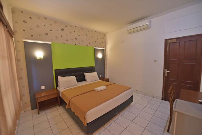 Imagen de la habitación del Hotel Sandat Kuta. Foto 13