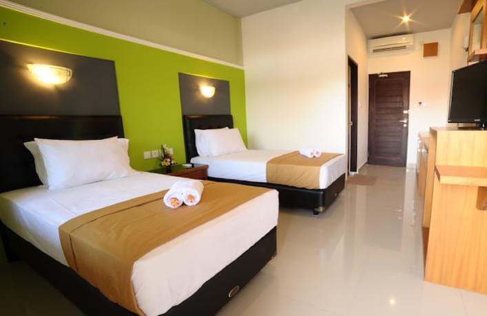 Imagen de la habitación del Hotel Sandat Kuta. Foto 14