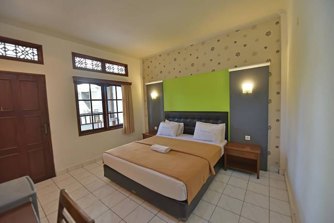 Imagen de la habitación del Hotel Sandat Kuta. Foto 16