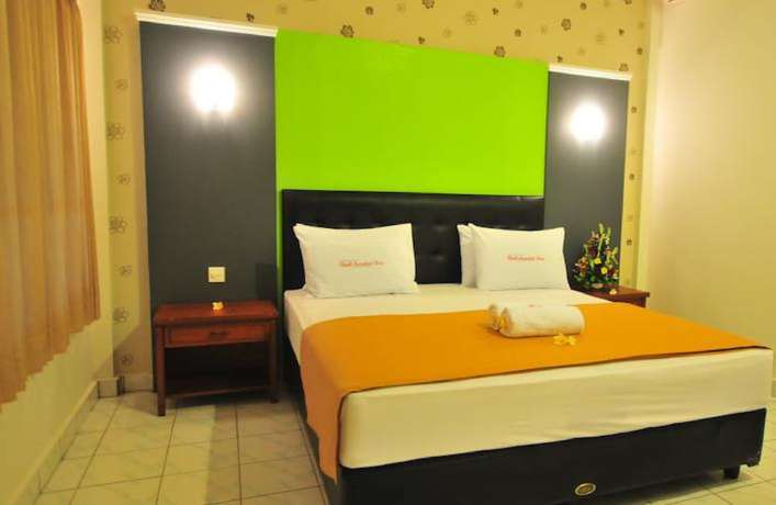 Imagen de la habitación del Hotel Sandat Kuta. Foto 18
