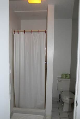Imagen de la habitación del Hotel Sandcastle Beachfront Inn. Foto 11