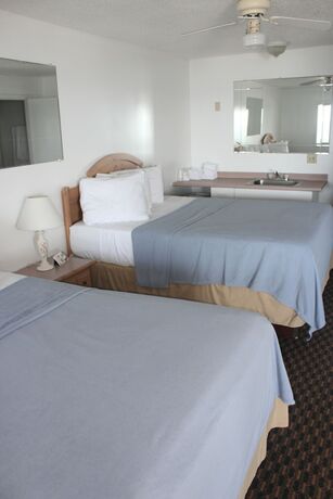 Imagen de la habitación del Hotel Sandcastle Beachfront Inn. Foto 15