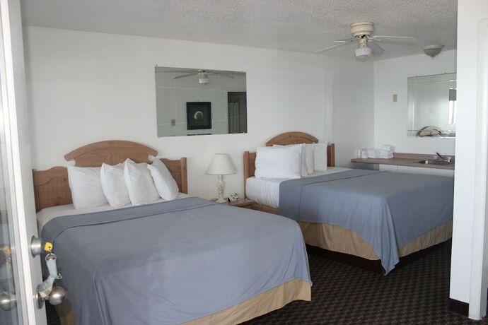 Imagen de la habitación del Hotel Sandcastle Beachfront Inn. Foto 16