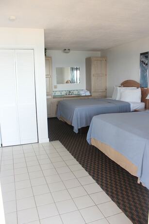 Imagen de la habitación del Hotel Sandcastle Beachfront Inn. Foto 18