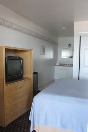 Imagen de la habitación del Hotel Sandcastle Beachfront Inn. Foto 19
