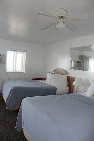 Imagen de la habitación del Hotel Sandcastle Beachfront Inn. Foto 20