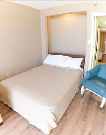 Imagen de la habitación del Hotel Sandcastle Oceanfront Resort South Beach. Foto 11