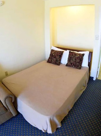 Imagen de la habitación del Hotel Sandcastle Oceanfront Resort South Beach. Foto 13