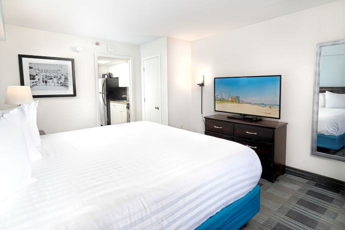 Imagen de la habitación del Hotel Sandcastle Oceanfront Resort South Beach. Foto 16