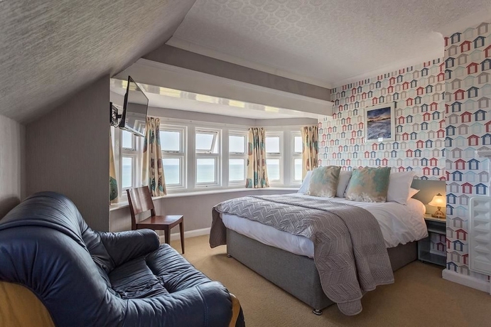 Imagen de la habitación del Hotel Sandcliff Guest House. Foto 5