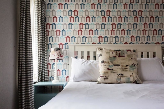 Imagen de la habitación del Hotel Sandcliff Guest House. Foto 7