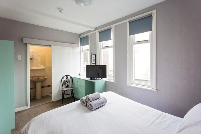 Imagen de la habitación del Hotel Sandcliff Guest House. Foto 9