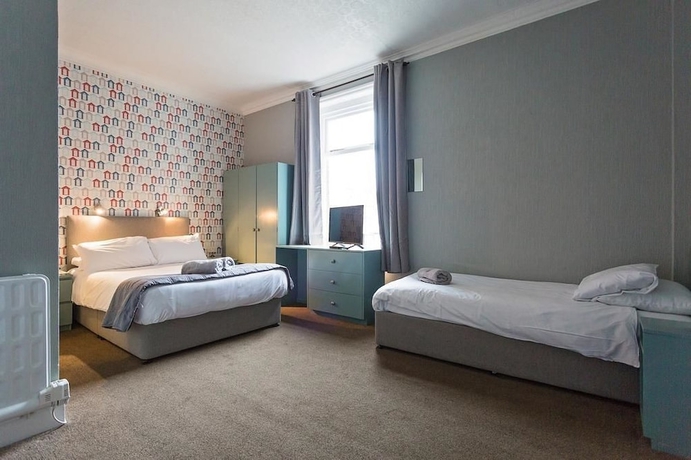 Imagen de la habitación del Hotel Sandcliff Guest House. Foto 10