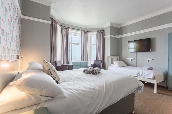 Imagen de la habitación del Hotel Sandcliff Guest House. Foto 12