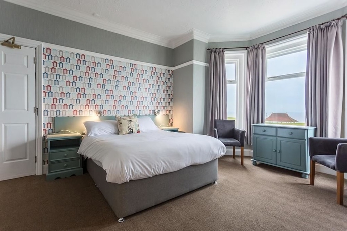 Imagen de la habitación del Hotel Sandcliff Guest House. Foto 14