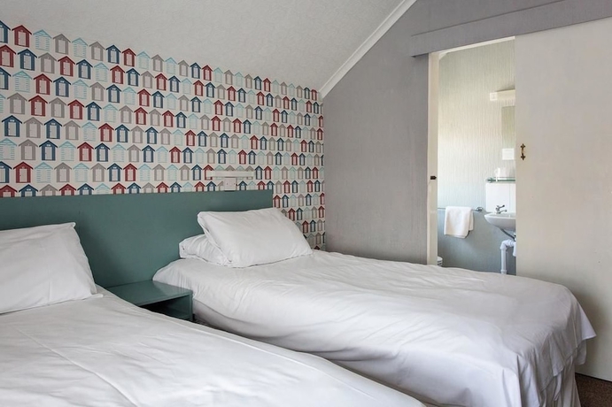 Imagen de la habitación del Hotel Sandcliff Guest House. Foto 15