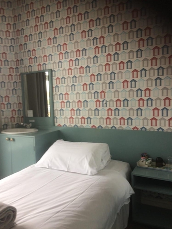 Imagen de la habitación del Hotel Sandcliff Guest House. Foto 16