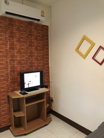 Imagen de la habitación del Hotel Sandee Place Chomthong. Foto 20