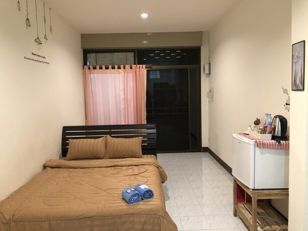 Imagen de la habitación del Hotel Sandee Place Chomthong. Foto 32