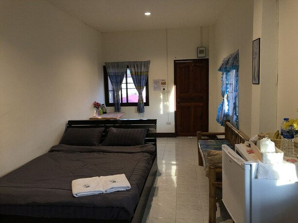 Imagen de la habitación del Hotel Sandee Place Chomthong. Foto 33