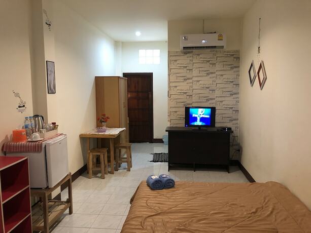 Imagen de la habitación del Hotel Sandee Place Chomthong. Foto 34