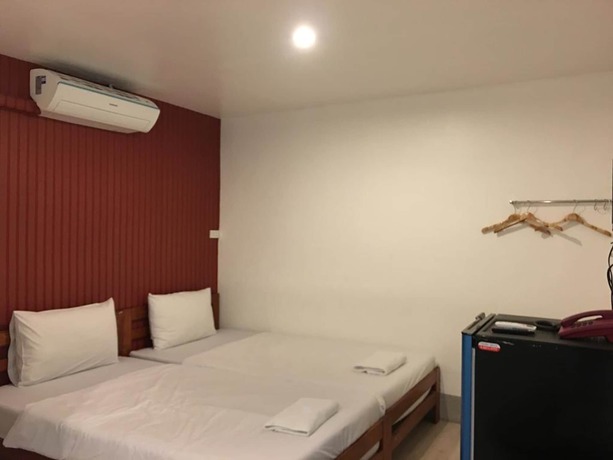 Imagen de la habitación del Hotel Sandee Room. Foto 8