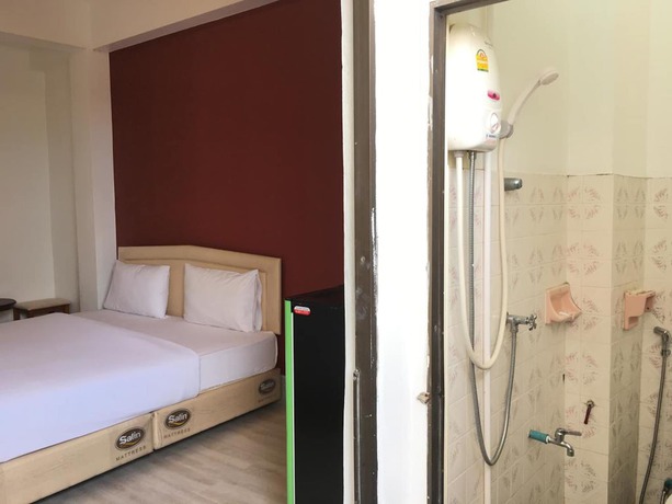 Imagen de la habitación del Hotel Sandee Room. Foto 10