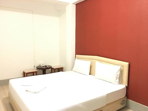Imagen de la habitación del Hotel Sandee Room. Foto 11