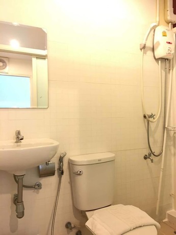 Imagen de la habitación del Hotel Sandee Room. Foto 15