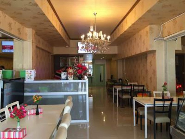 Imagen de la habitación del Hotel Sandee Room. Foto 17