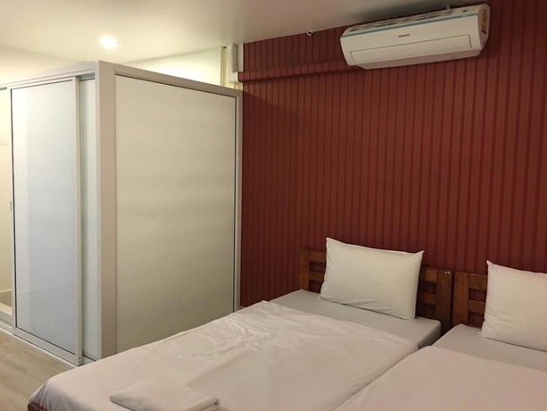 Imagen de la habitación del Hotel Sandee Room. Foto 19