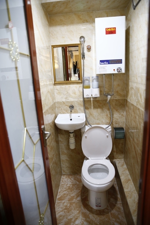 Imagen de la habitación del Hotel Sandhu Guest House. Foto 11