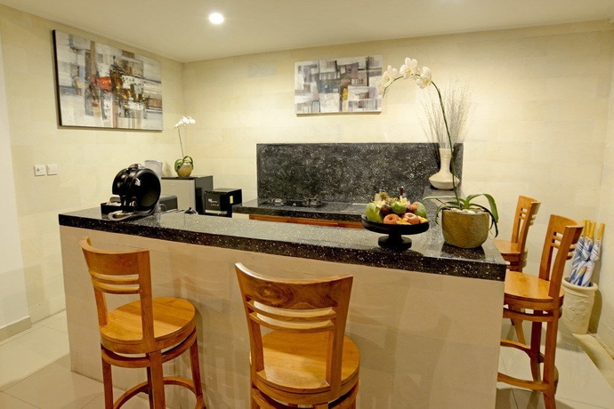 Imagen de la habitación del Hotel Sandi Agung Villa. Foto 9