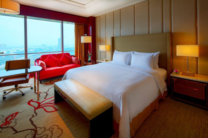Imagen de la habitación del Hotel Sanding New Century Grand. Foto 8