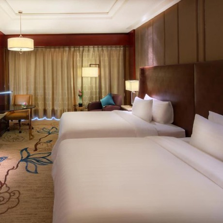 Imagen de la habitación del Hotel Sanding New Century Grand. Foto 9