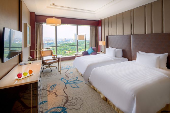 Imagen de la habitación del Hotel Sanding New Century Grand. Foto 13