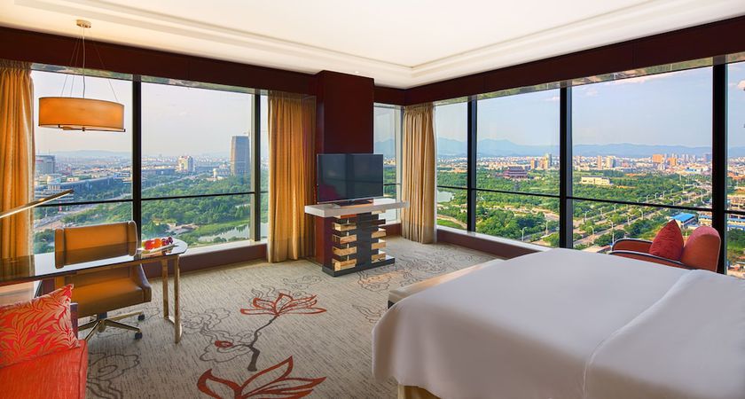 Imagen de la habitación del Hotel Sanding New Century Grand. Foto 17