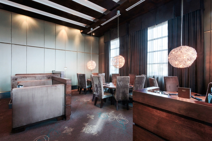 Imagen del bar/restaurante del Hotel Sandman and Suites Winnipeg Airport. Foto 3